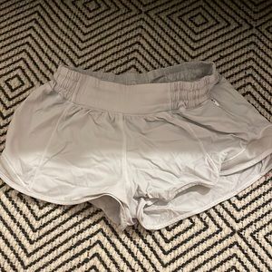 WHITE LULU LEMON SHORTS.